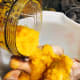 In a bowl, combine the chicken and the paste.