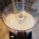Then I pour my flour into the food processor.