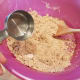 Then I dump it into a large bowl and add all of my other ingredients. If your dough isn't coming together, you may need a little more water.