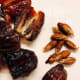 Remove the pits from the dates before chopping them.