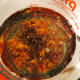 Add the dates to the boiling water and baking soda. Set aside.