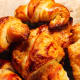 Freshly baked croissants are a beautiful golden brown.
