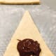 For filled croissants, place 1 teaspoon of filling at the bottom of the triangle before rolling.
