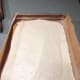 The second fold and roll.