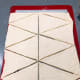 Cut the dough into triangles.