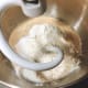 Combine the flour, sugar, warm water, yeast, and milk in the mixing bowl.