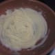 Step 5: Slowly add milk to butter and flour base