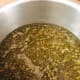 Transfer the mung beans to a larger pot, add water. Let the water to boil.
