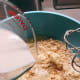 Combine the milk and water into the flour mixture.