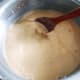 Stir the mixture with a wooden spatula.