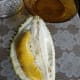 The flesh of the durian is thick, not solid, yellow colored, and has a sweet taste.
