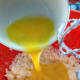 Add the lightly beaten eggs into the mixture.