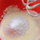 Gradually add the flour while beating at lower speed.