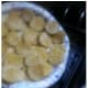 Gently place coated pickles in the deep fryer