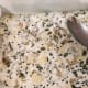 Spread the mixture into a thin, even layer.