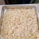 Dump the sliced almonds on a tray and bake for 5 minutes in the oven.