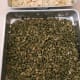 Dump the pumpkin seeds on a tray and bake for 5 minutes in the oven.