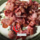 Fried bacon slices.