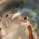 Add the water slowly into the pot.