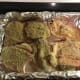 Place chops on top of the onion slices and place in preheated oven.