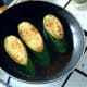 Spiced zucchini or courgette wedges are quickly fried