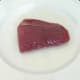Oiled and seasoned tuna fillet