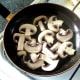 Sauteing sliced mushrooms