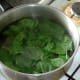 Spinach is blanched in salted water