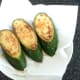 Zucchini wedges are drained on kitchen paper
