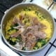 Flaked mackerel fillets and black pepper are added to the spinach and turmeric rice