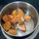 Garlic, ginger and black pepper are added to the drained sweet potatoes
