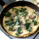 Spinach and mushroom tortilla is ready to serve