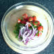 Salad ingredients are combined in a small bowl