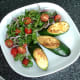 Plated zucchini wedges and salad