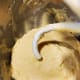 Reduce the speed when adding the butter, and continue to mix at high speed to combine.