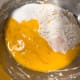 Combine remaining eggs, flour, sugar, salt, and vanilla essence.