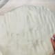 Transfer the dough on a floured surface or kneading board. Gently press the dough by using your fingers to let the air out.