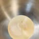 In a mixing bowl, combine warm water, active dry yeast, and sugar or honey.