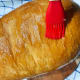 Brush the top with melted butter.