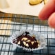 Garnish with some almond nibs.