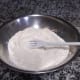 In a separate bowl, mix the dry ingredients together with a mixing spoon.