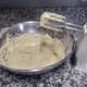 Add half the dry mixture to the sugar mixture, add the yogurt, and then add the rest of the dry mixture. Add the vanilla last.