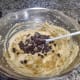 Add the mashed bananas and chocolate chips to the batter and mix gently.
