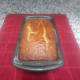 Remove the pan from the oven after 1 hour or when a toothpick inserted in the middle comes out dry.