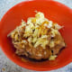 In a bowl, add chicken, yogurt, ginger-garlic paste and all of the dry spices.