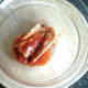 Canned sardines in tomato sauce are emptied in to a large bowl