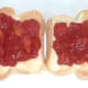 Tomato sauce spread on hot toast