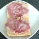 bacon rashers are laid on hot toast