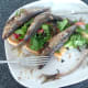 Enjoying paprika spiced sardines and chorizo salad on toast