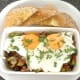 Enjoying hot and spicy fisherman's eggs with toast